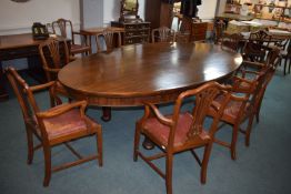 Edwardian Mahogany Oval Dining Table and Twelve Carvers