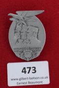 Nordmark-Treffen Badge, 1936, aluminium badge in oval form depicting three uniformed heads beneath