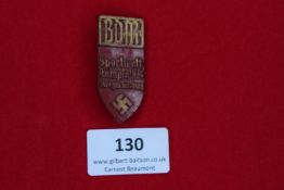 BDM Sports Competition Badge, 1939, a shield-shaped red and gilt badge inscribed Sportwettkampf