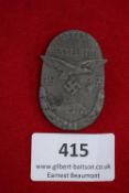 Frankentag Hesselberg Badge, 1937, a pressed grey metal badge in oval form depicting a German