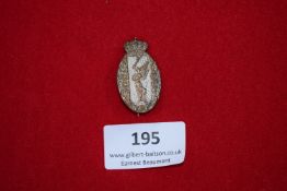 K.P.K. 1714–1914 Commemorative Badge, oval silvered badge surmounted by crown, depicting winged