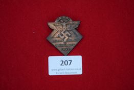NSFK Meeting Badge, bronze diamond-shaped badge with eagle and swastika inscribed Deutsches