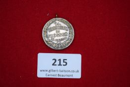 Regatta Medal, silvered circular medal depicting a townscape to obverse, reverse inscribed “14.
