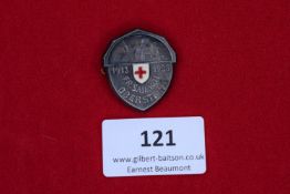 Red Cross Commemorative Badge, Oberstein 1913–1928, a silvered and enamel shield-shaped badge with