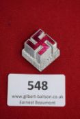 Nationale Solidarität Badge, a small silvered badge in the form of a cube, red enamel swastika to