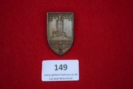 NSDAP Volksfest Badge, Main-Taunus 1935, a bronze shield-shaped badge depicting tower with eagle and