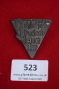 Schleizer Dreieck Rennen Badge 1934, a triangular zinc-finish badge inscribed Schleizer Dreieck