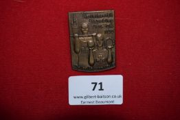 District Gymnastics Festival Badge, Straubing 1935, a rectangular bronze badge depicting athletes