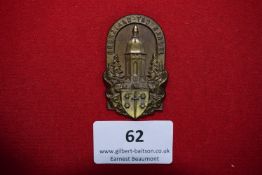 Borderland Day Badge, Kandel, an oval bronze badge depicting tower flanked by fir trees above city