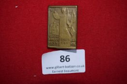 Commemorative Medal with Ribbon, a gilt and enamel badge suspended from black-white-red bow,