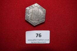 Watchmakers’ Congress Badge, Köln 1926, a hexagonal silvered badge depicting Cologne Cathedral,