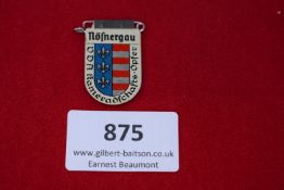 Nössnergau VDA Tinnie, a pressed-tin badge with enamel finish, depicting arms with fleurs-de-lis and