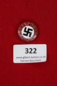 N.S.D.A.P. Rally Badge “Nun Erst Recht” – A circular enamel badge with swastika to centre, red