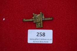 Rome–Berlin Axis Badge, a bronze bar brooch depicting helmeted profiles of German and Italian