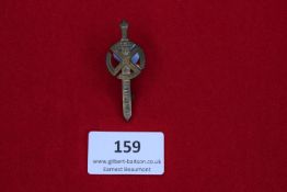 Sonnenwende Badge, 1934, bronze badge in the form of sword and sunwheel, inscribed Sonnenwende