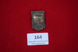 Zeppelin Event Badge, Saarbrücken 1933, a bronze shield-shaped badge inscribed Zeppelinlandung