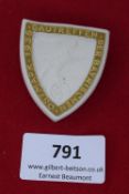 Gau Day Badge 1936, pressed ceramic shield-shaped badge with gilt border, inscribed Ostmark