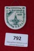 1933 Reichsjugendtag Karlsbad Porcelain Badge, a white porcelain shield-shaped badge printed in