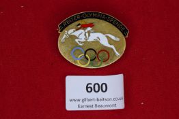 Reiter-Olympia-Spende Badge, an oval gilt and enamel badge depicting a mounted horse and rider above