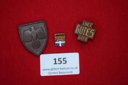 Mixed Lot of Badges (3), including Fürs Gutes Alten brown cross, enamel Antibes crest pin, and