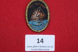 Count Luckner’s World Voyage Badge, an oval embroidered cloth badge with gilt border, depicting