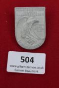 Gau Westfalen-Süd Badge, Hattingen 1935, a rectangular zinc badge with rounded base, depicting eagle
