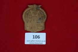 Day Badge, Wolfenbüttel 1936, a pressed card badge, oakleaf wreath design surrounding view of the