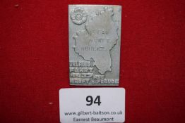 Rectangular tinnie badge, “Urlaubsfahrt KdF, Gau Württ. Hohenz.”, showing regional map. Maker: Adolf
