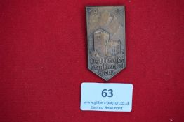 East Tyrolean Costume Festival Badge, Lienz 1939, a bronze shield-shaped badge depicting castle