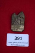 NSBO Kreistagung Berchtesgaden Badge, August 1933, a bronze-finish pressed metal badge depicting