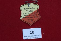 Cavalry Meeting Badge, Homburg (Saar) 1935, a printed card shield-shaped badge, inscribed