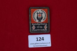 Sänger Gau Westmark Rally Badge, Saarbrücken 1936, a rectangular framed cloth badge, printed in