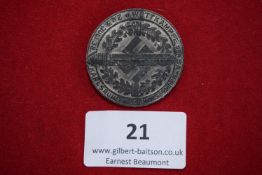 SA Group Baden-Südwest Sports Competition Badge, Karlsruhe 1934, a grey alloy circular badge with