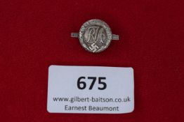 RAD Membership Badge, a small silvered badge for the Reichsarbeitsdienst (RAD), circular with raised