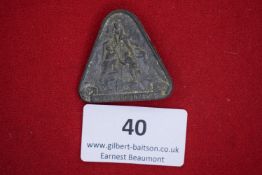 Hitler Youth Climbing Badge, 1935, a triangular grey alloy badge depicting group of climbers with