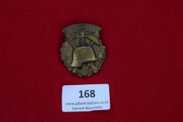 Commemorative Badge, Nürnberg 1936, a bronze shield-shaped badge with oakleaf wreath, displaying