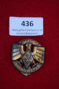 Hitlerjugend Day Badge, 1936, a gilt-finished pressed metal badge with central HJ diamond and