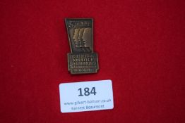 Sängerbundesfest Badge, Hannover 1928, a bronze rectangular badge with stylised singers’ heads and