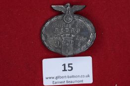 NSDAP Kreis Day Badge, Mülheim/Ruhr 1936, a darkened pressed metal oval badge with eagle and