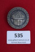 Kriegsopfertag Hamburg 1934 Badge, circular bronze-finish badge depicting eternal flame above city