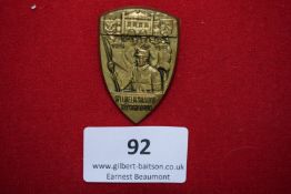 Brass tinnie badge, shield form, “5 Jahre SA 1928–1933 Wilhelmshaven–Rüstringen,” showing