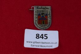 Kulmsee Badge, a pressed-tin shield badge with enamelled-style depiction of town gates and eagle,