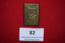 District Gymnastics Festival Badge, Bad Rappenau 1932, a gilt pressed badge depicting rearing