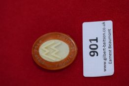 Leipzig Trade Fair 1936 Plastic Tinnie, an oval-shaped early plastic badge in amber colour with