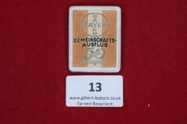 Bayer Company Outing Badge, a rectangular textile badge with silver trim, printed Bayer