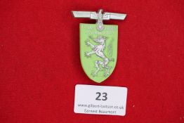 Gau Day Badge, Styria 1939, a shield-shaped green painted alloy badge, surmounted by spread eagle