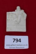 1932 Bayr. Ostmark Porcelain Badge, a white porcelain badge depicting a seated figure, inscribed “