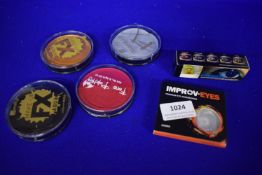 Assorted Face Paints and Contact Lenses