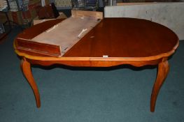 Oval Extending Dining Table