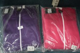 2x Kid’s Hooded Onesies Size: 11-12 years (1x pink, 1x purple)